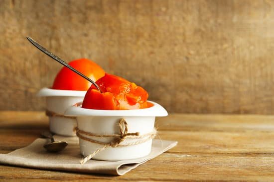 canva two persimmons with a spoon in a cup MAD