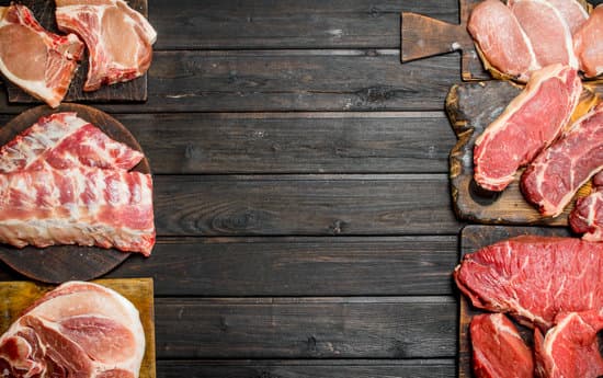 canva variety of meat o wooden boards flatlay MAEPtG