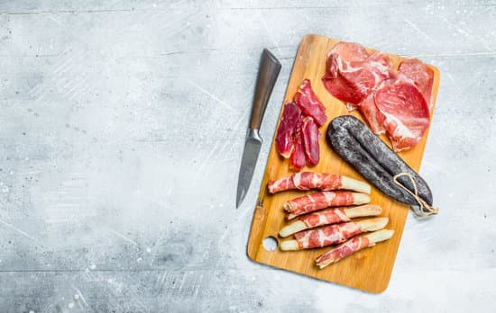 canva various meats on a wooden board MAEQKpii9OE