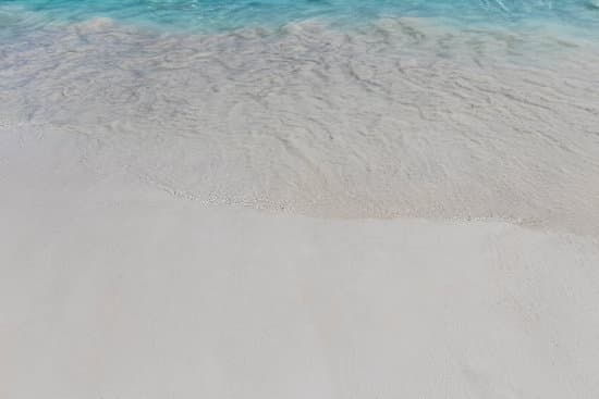 canva white sand and blue sea MAERgS3idaY