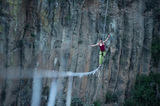 canva woman climbing on a rope MAETRIlNQ Q