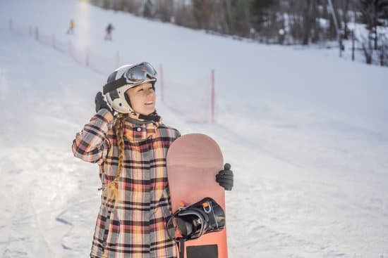 canva woman snowboarder on a winter day at a ski resort MAELBior4bQ
