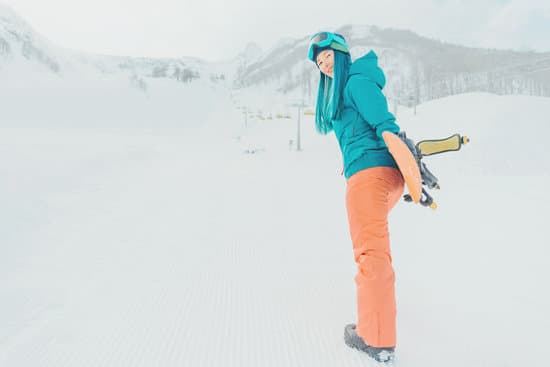 canva woman with snowboard MAEbb2fyz2k