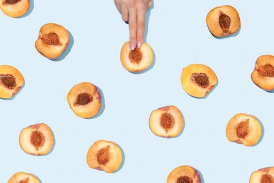 canva womans hand touching slices peaches MADWsacDqUM