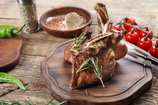 canva wooden board with tasty meat on table MAD9T93Ye5c