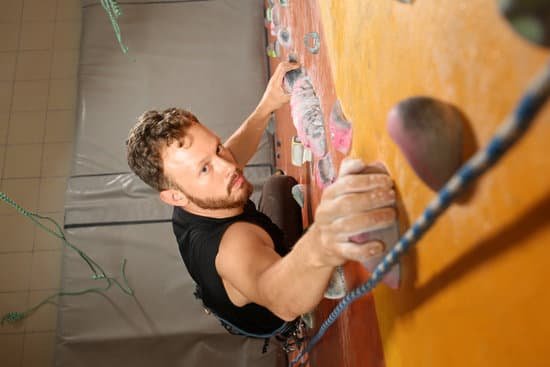 canva young man exercising in climbing gym MAD9UIMgZm4