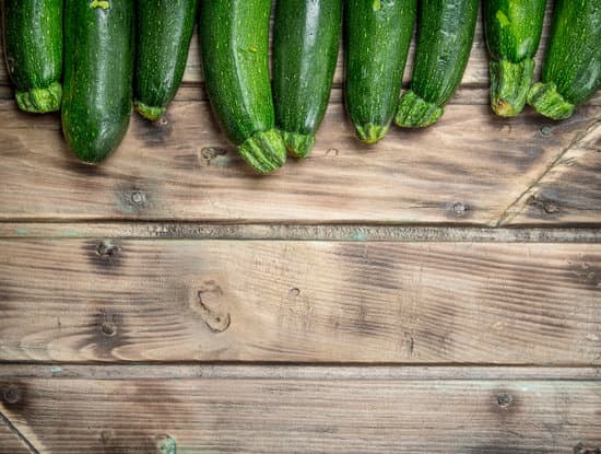 canva zucchinis on a wooden table