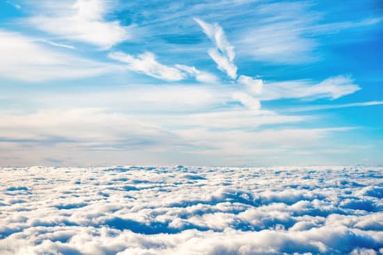 canva aerial view of blue sky with layers of white clouds MAD8KJ3kINo