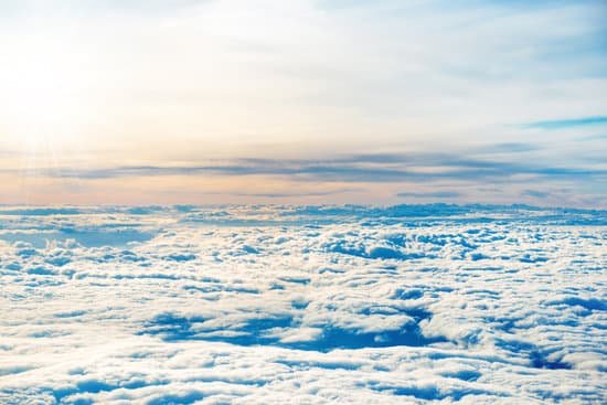 canva aerial view of blue sky with layers of white clouds MAEE2LN6UDg