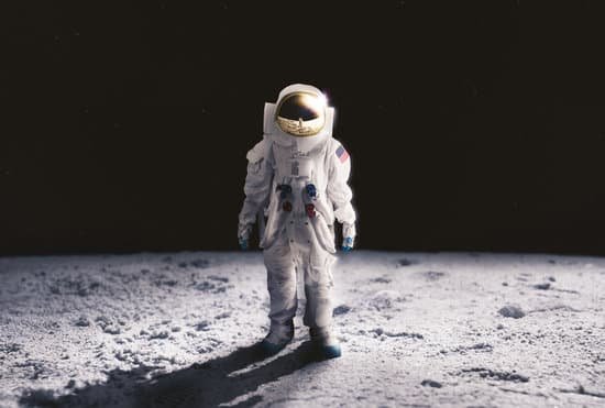 canva astronaut standing on the moon surface MADesdgQyS4