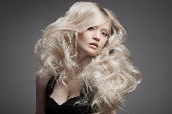 canva beautiful blond woman. curly long hair MADaql i6HU