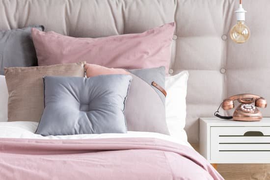 canva bed with pastel color pillows MADaFvhwhPA