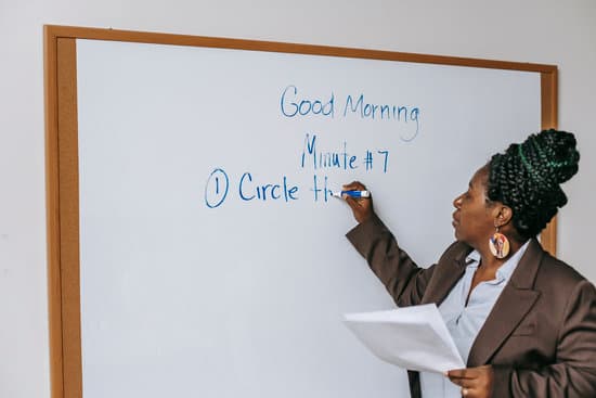 canva black female teacher writing on whiteboard MAENvyqRRVM