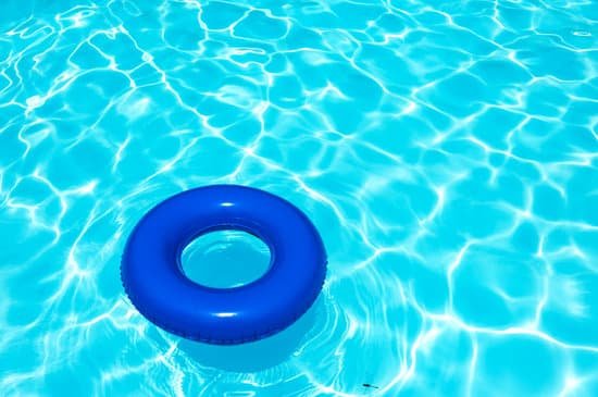 canva blue buoy on swimming pool MADaAZksirY