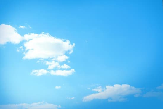canva blue sky with minimal cumulus clouds background MAD McTN KE