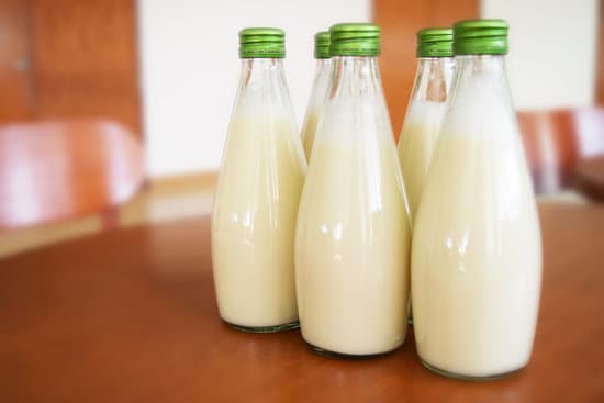 canva bottles of milk on the table MADQtgqg9Ck