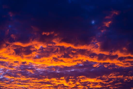 canva burning sunset in the sky background MAEOvr y70w