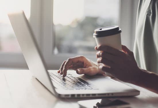 canva businessman using laptop computer MADaFvNfeMU