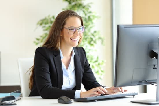 canva businesswoman working wearing glasses MADaAW5Kg0Y
