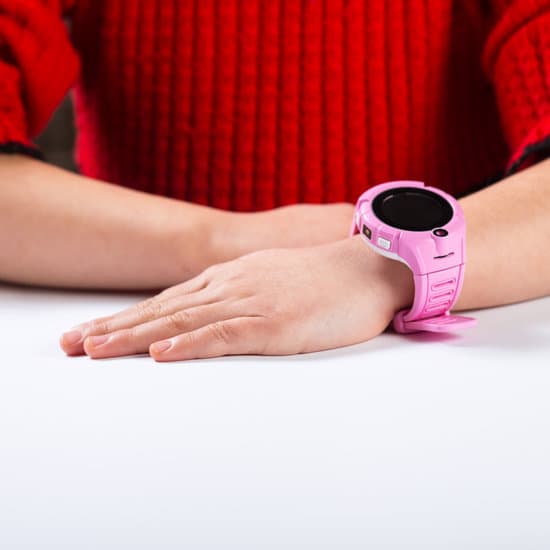 canva child with smart watch. kid s hands with pink watch . hands with gps watch MAEUrjue3yQ
