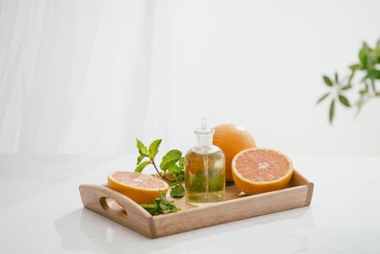 canva citrus fruit vitamin c serum oil beauty care anti aging natural cosmetic. essence aromatherapy. MADaADI6X8I