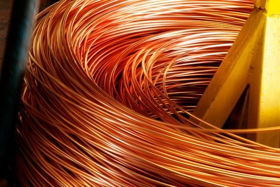 canva closeup of copper cable being rolled up MAC4bahZJI8