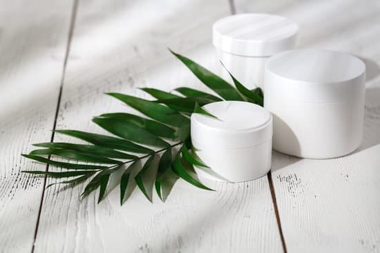 canva cosmetic cream and beautiful spa containers on white table