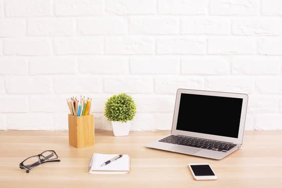 canva creative desk with laptop MADasLT6BZk