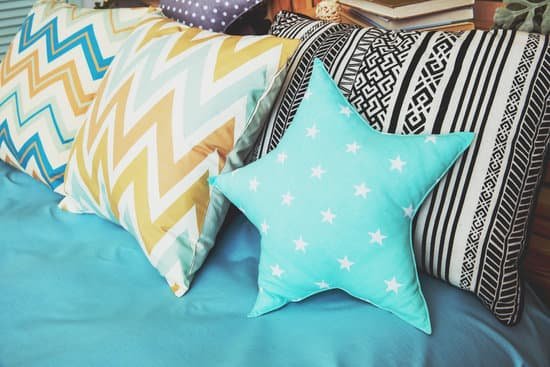 canva different soft pillows on the bed MADauUScLzM