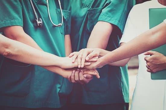 canva doctors and nurses coordinate hands. concept teamwork MADas2KyKl4