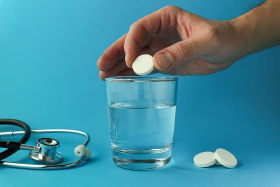 canva effervescent vitamin c tablet and glass of water MAEQUhEiZEI