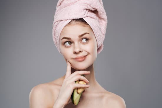 canva emotional woman towel on head shower clean skin avocado vitamins natural cosmetics MAELO9QaBn8