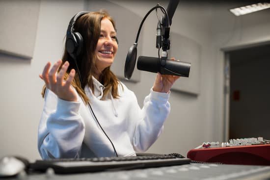 canva female jockey communicating on microphone in radio studio