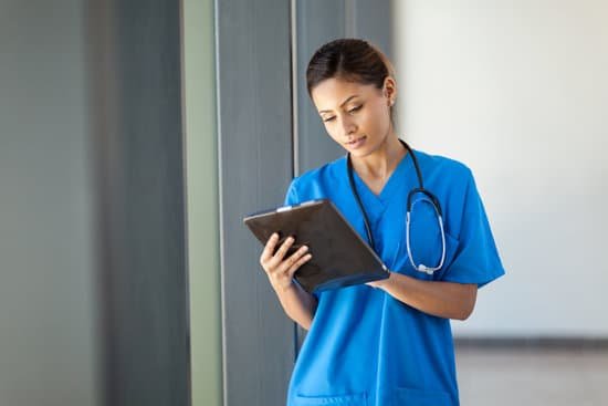canva female medical nurse using tablet computer MADaAGx8W o