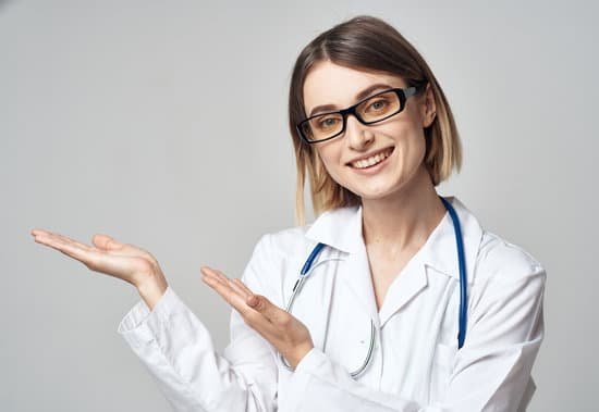 canva female nurse in medical gown gesturing with hands on light background cropped view MAELvDCUjYg