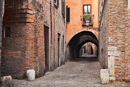 canva ferrara italy the medieval alley via delle volte MADv06KJjZk