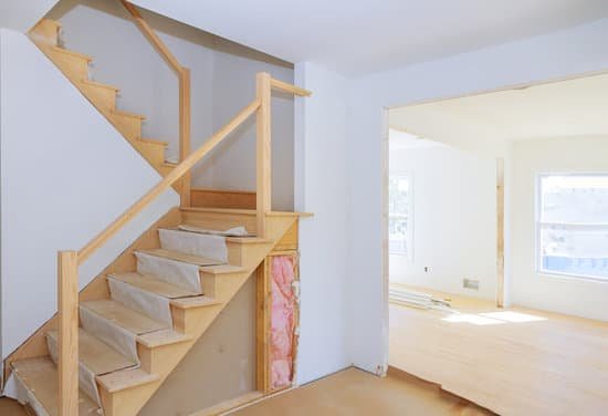 canva finishing plaster boards in staircase and room under construction MAD674cStCA