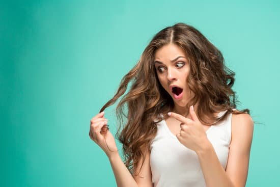 canva frustrated young woman having a bad hair on blue