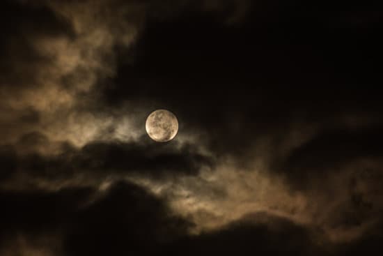 canva full moon in a cloudy night MADQ4yhS7Cg