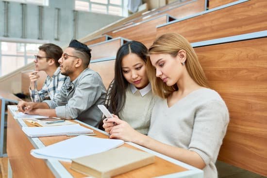 canva girls using smartphone in college MADat3zBi I
