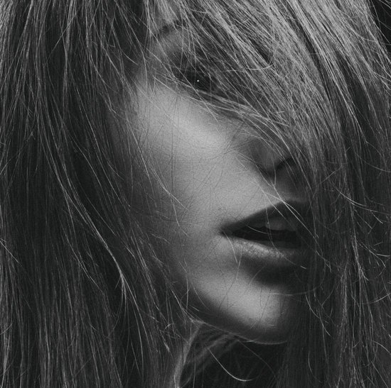 canva grayscale photography of womans face covered by hair MADGvwbCkZo
