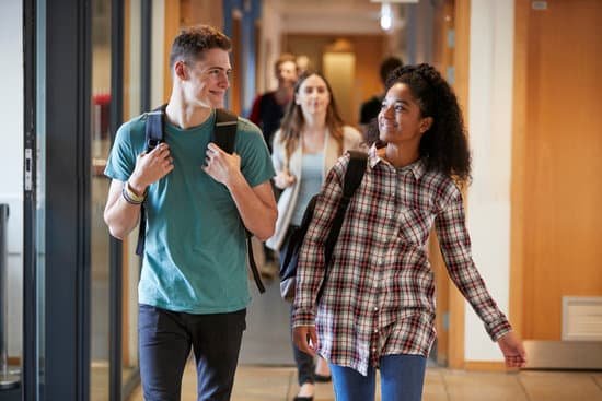 canva group of college students walking through college corridor