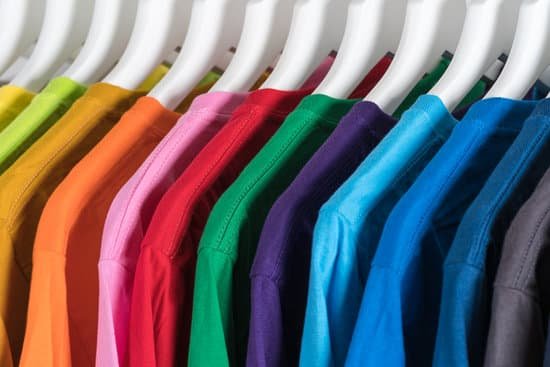 canva hangers with colorful cotton t shirts in wardrobe MAEHR qCTcU