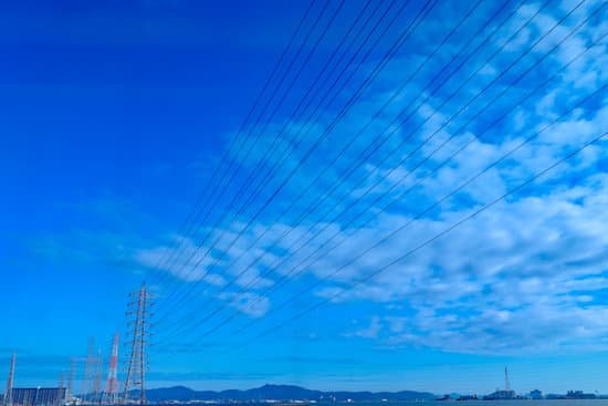 canva high volt electric line tower with blue sky on background japan MADZCZHWz4I