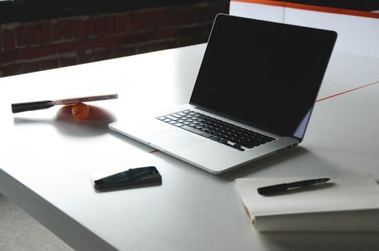 canva laptop on white table MABK3iwzzLM