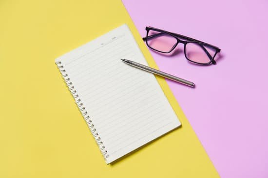 canva lined notebook with pen and eyeglasses MADqeovjnH0