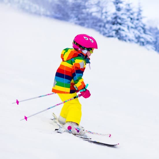 canva little child skiing in the mountains MADE9pcEb U