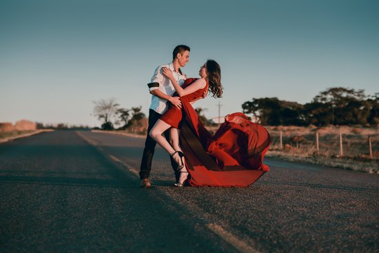 canva man and woman doing dance post in concrete road at daytime MADGyZ8dpeQ