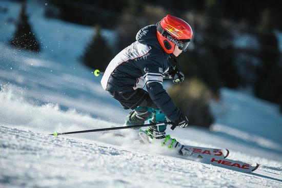 canva man doing ice skiing on snow field in shallow focus photography MADGyUGDTbU