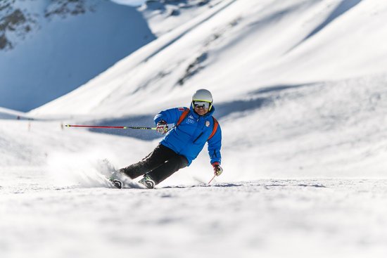 canva man snow skiing on bed of snow during winter MADGyTe7T Q